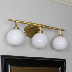 Michael 6.75 in. 3-Light Antique Brass with Milk Glass Vanity Light by Decor Therapy -Decor Therapy Shop antique brass decor therapy vanity lighting wl1157 1f 1000