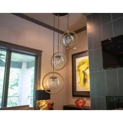 Griggs Globe 3-Light Black and Antique Brass Pendant by Decor Therapy -Decor Therapy Shop black metal and antique brass decor therapy chandeliers ch1863 76 1000