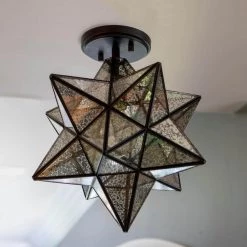 Star Shape 14 in. 1-Light Antique Bronze Semi Flush Pendant by Decor Therapy -Decor Therapy Shop bronze decor therapy flush mount lights ch1876 4f 1000