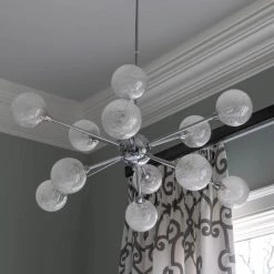 Susan 12-Light Chrome Pendant Light by Decor Therapy -Decor Therapy Shop chrome decor therapy chandeliers ch2040 c3 1000