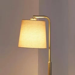 56 in. Gold Metal Downbridge Floor Lamp with Black Resin Star Base by Decor Therapy -Decor Therapy Shop gold black decor therapy floor lamps pl4548 76 1000